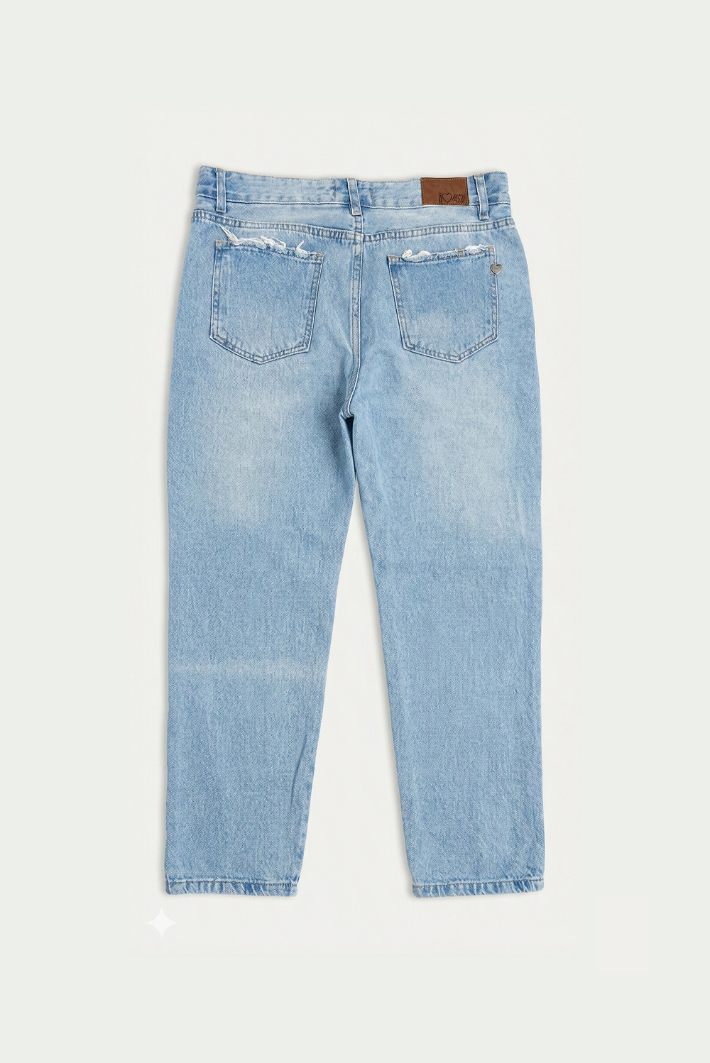 JEAN TIRO CRUZADO CON ROTURAS